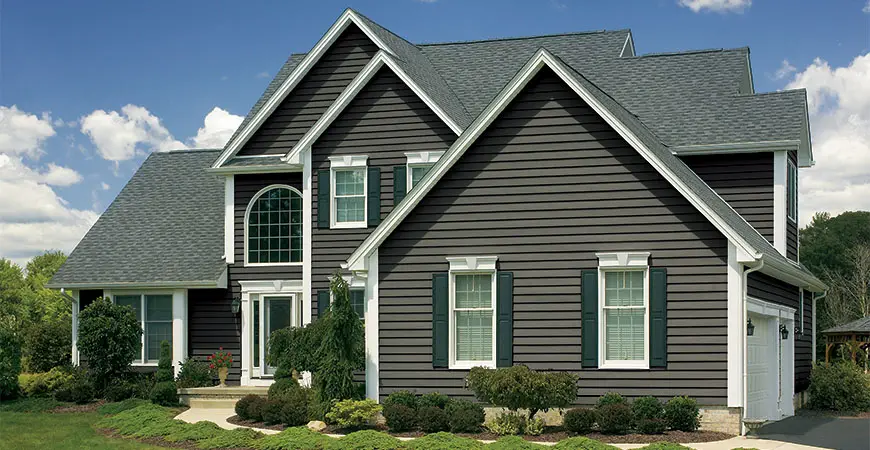 Grey home with double hung windows